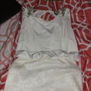 Pretty off white dress. Rimestones & lace bottom